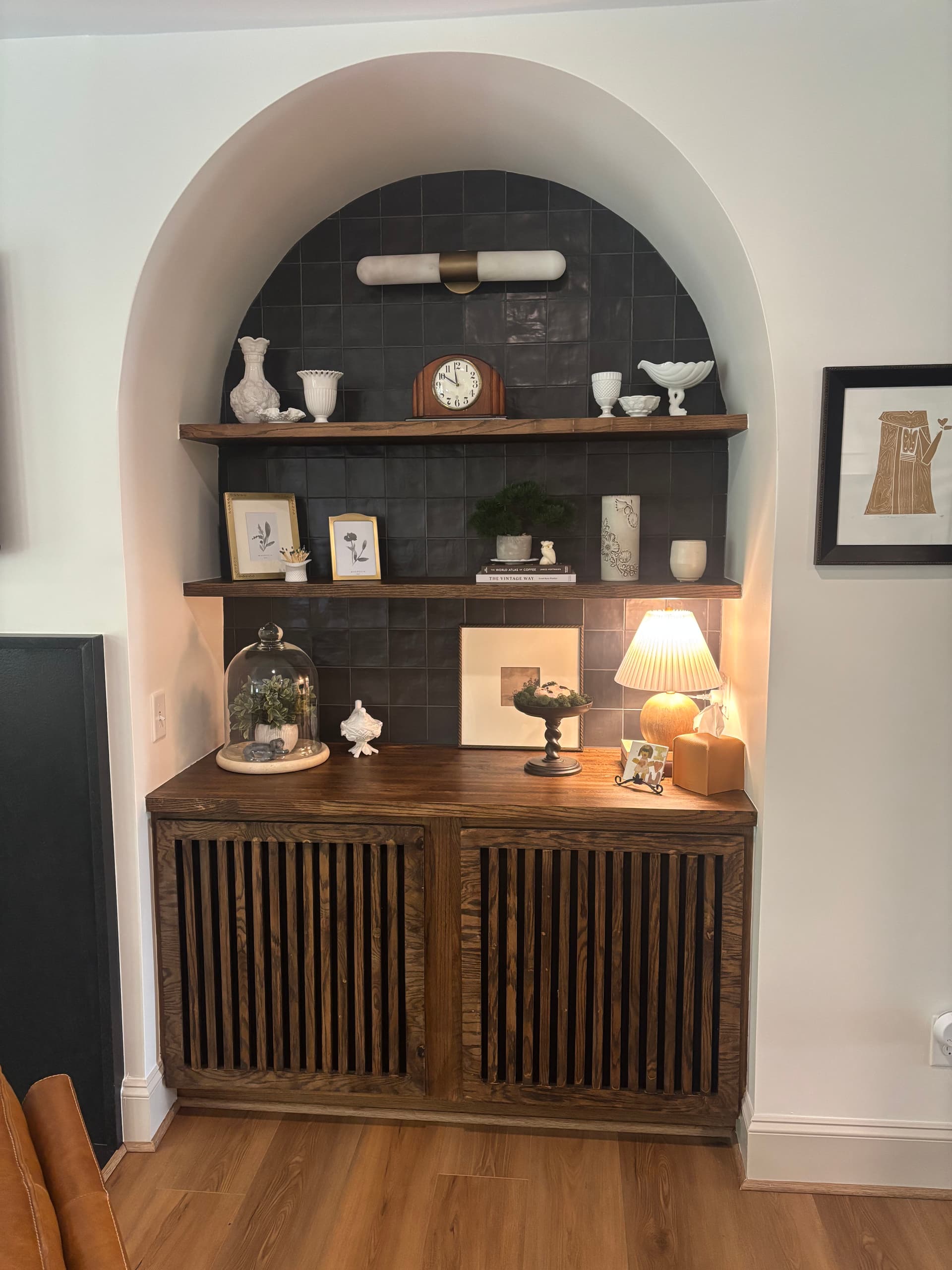 Custom Built-In Arched Niches That Completely Changed a Living Room image